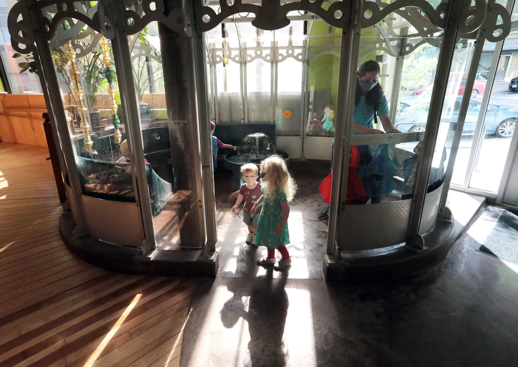 Visitors at water station at Madison Children's Museum